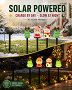 Solar powered Christmas stake lights charge by day and glow at night