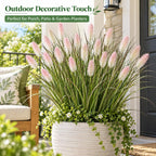 Artificial dog tail grass in an outdoor planter for porch and garden decor
