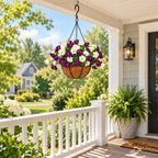 Artificial white and purple petunia hanging basket on a sunny front porch